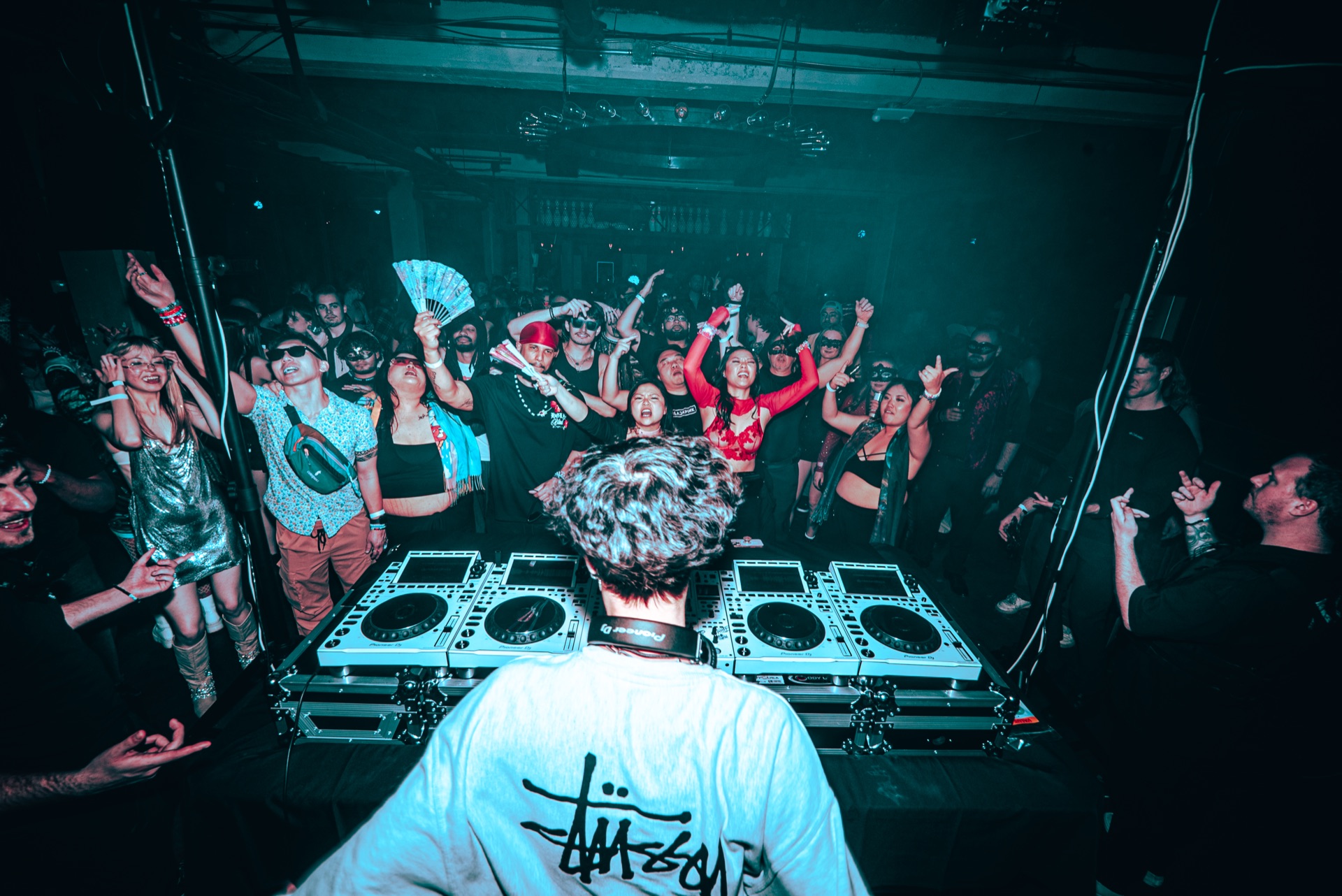 DJ behind decks